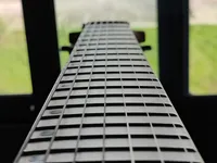 guitar neck showing all the frets